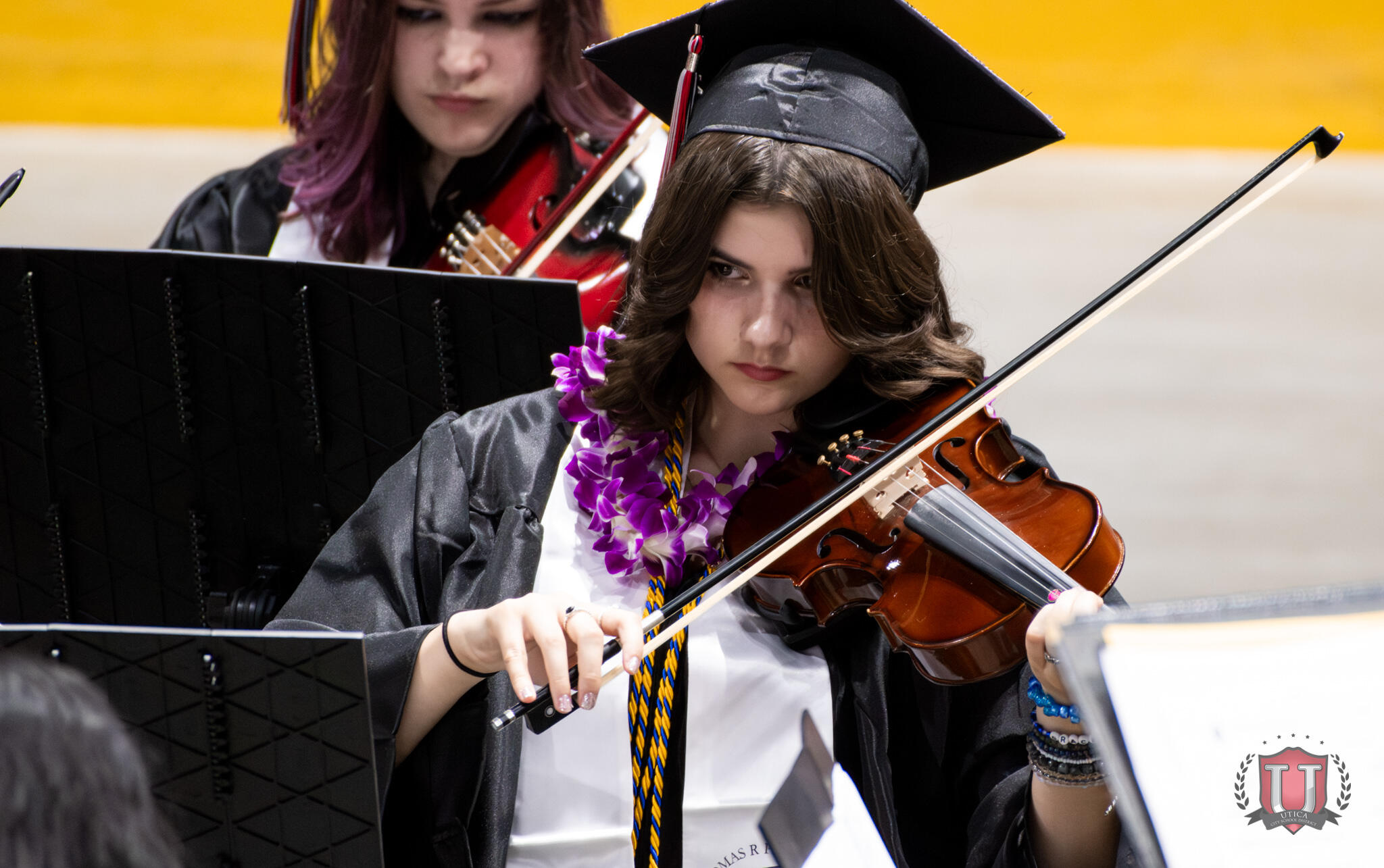 Graduates performing in the band during the graduation ceremony