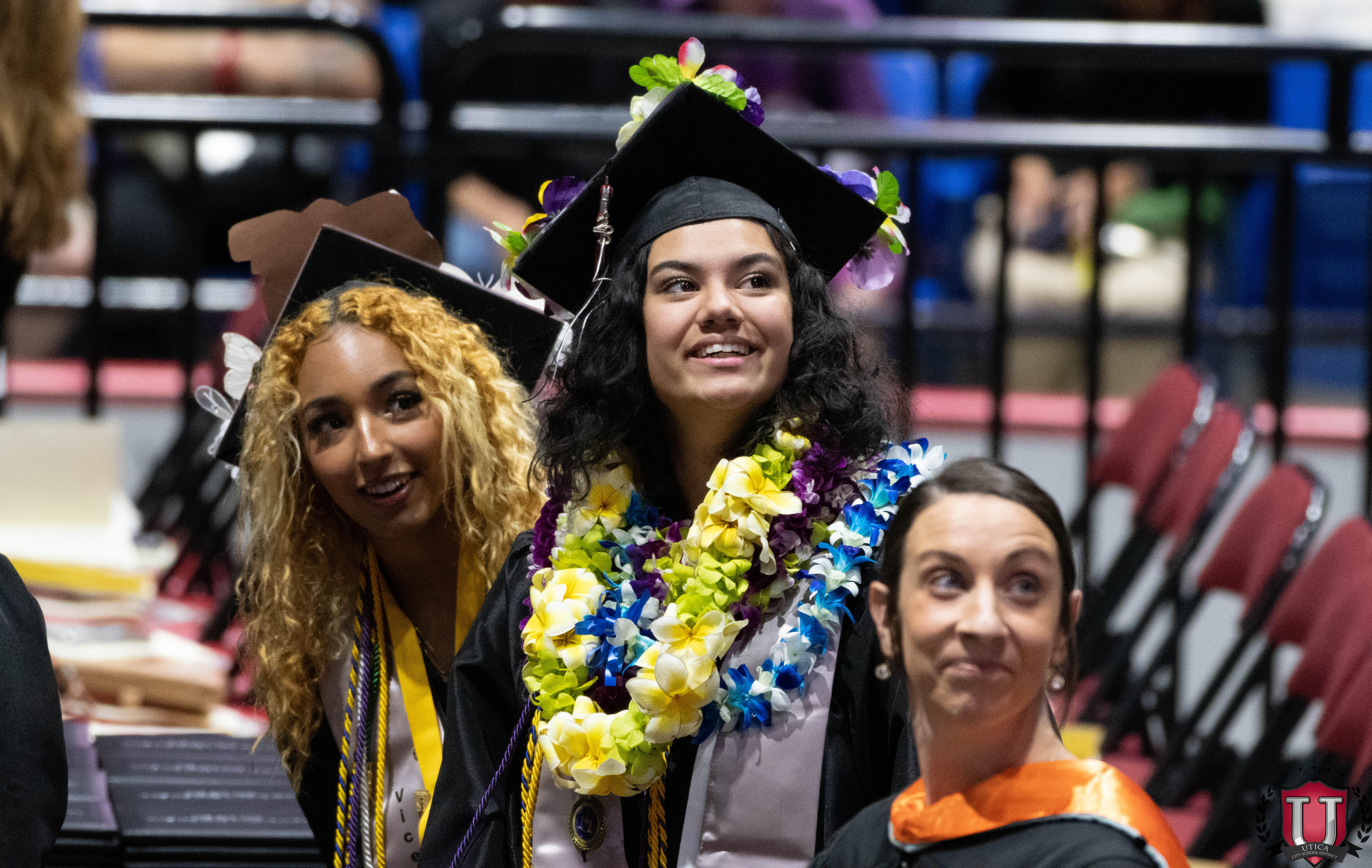 Graduates smiling standing together